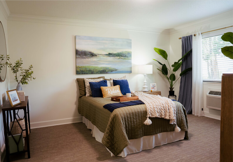 Cozy Furnished Bedroom With Natural Light at Assisted Living Facility Cozy Furnished Bedroom With Natural Light at Assisted Living Facility