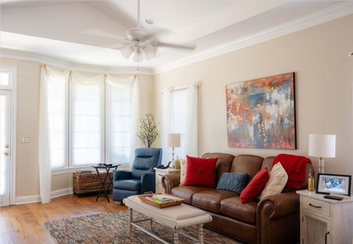 Spacious Living Room With Bay Windows in Independent Living Cottages Spacious Living Room With Bay Windows in Independent Living Cottages