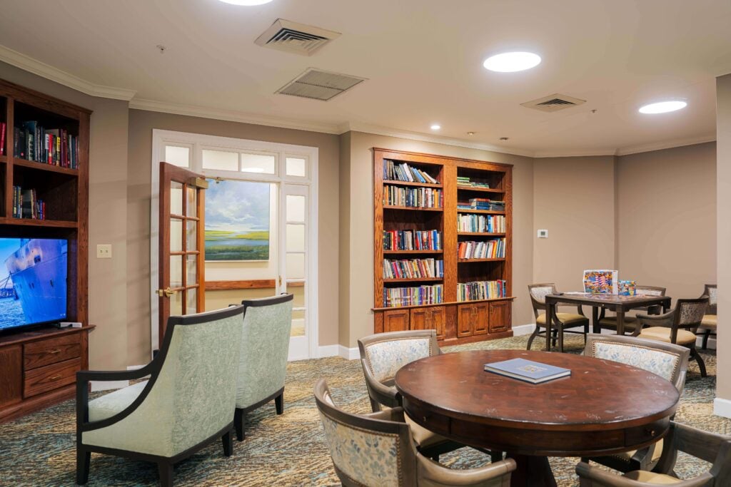 Library and Activity Room With Bookshelves at Assisted Living Facility