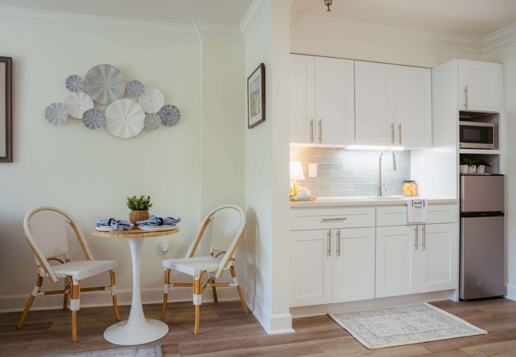 Apartment Kitchenette With Bistro Dining Table at Assisted Living Facility